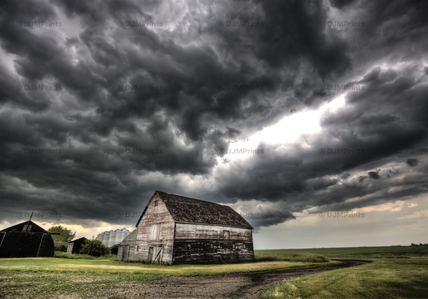 Storm Clouds Saskatchewan old farm and darkened skies